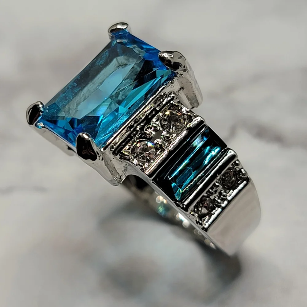 Silver Tone Simulated Blue Topaz Gemstone Ring